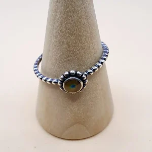Anillo que cambia de color en plata 925 con banda de bolitas oxidada